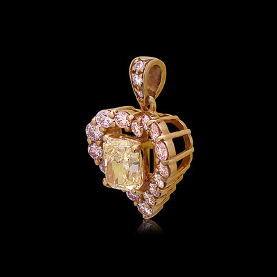 Fancy Yellow and Pink diamond halo heart shape pendant by Graff
