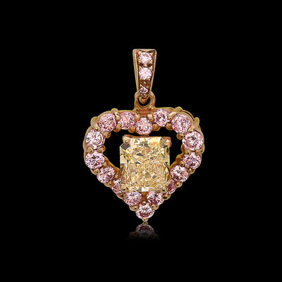 Fancy Yellow and Pink diamond halo heart shape pendant by Graff